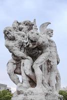 Statue in Ponte Vittorio Emanuele II, Rome, Italy photo