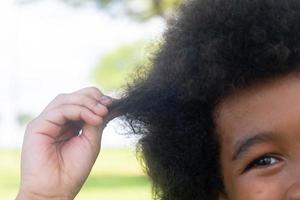 Boy showing off hair photo