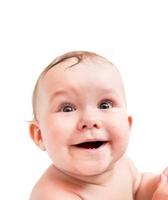 Cute happy baby laughing on white photo