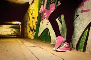 Poland, 2022 - Close up of pink sneakers worn by a teenager. photo
