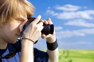 Photographer taking pictures photo