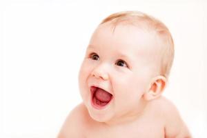 Cute happy baby laughing on white photo