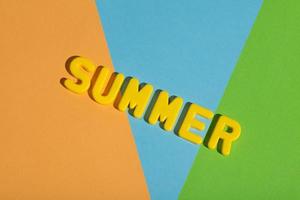 SUMMER writing on a colorful pastel background photo