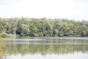 Lake with forest and summer camping tends holidays background fine art high quality prints products fifty megapixels Absberg photo