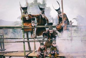 Phi ta khon or halloween of Thailand - phi ta khon festival ghost mask and colorful costume fun traditional thailand mask the show art and culture loei province Dan Sai thailand festival photo