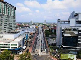 Jakarta, Indonesia, 2021 - Beautiful aerial view, office buildings and traffic. photo