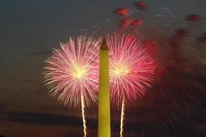 Fireworks light up the sky behind the Washington Monument on July 4, 2022. photo