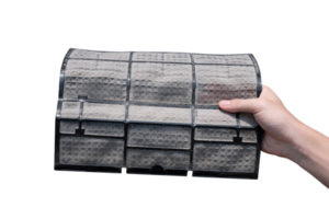 Man's hand holding dirty air conditioner filter on transparent background png