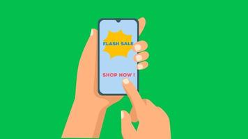 animação de venda em flash com sacola de compras em um smartphone. imagens de animação de venda em flash de fundo de tela verde