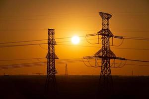 Electrical Towers at sunset photo