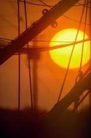 Sunset thru Shrimp Boat Netting photo