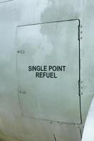 Single point refuel decal on an old aircraft. photo