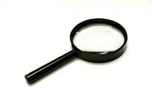 Magnifying glass isolate on white background and make with paths. photo