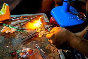 Image of hand made doll glass blowing. photo