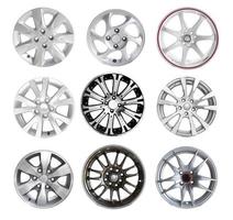 Collection of steel alloy car rim isolated on white photo