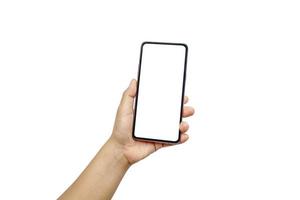The hand is holding the white screen, the mobile phone is isolated on a white background with the clipping path. photo