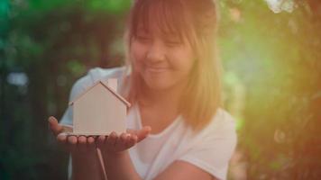 An Asian woman shows a happy expression. photo