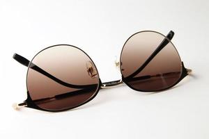 Sunglasses on white background photo