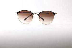 Sunglasses on white background photo