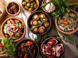 A top view of a restaurant table with gourmet Georgian dishes photo