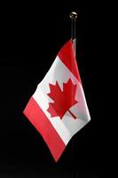 canada flag on a black background with copy space. Canada Day photo