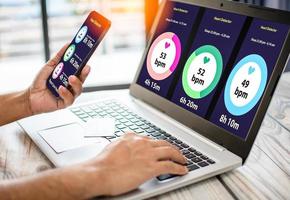 man holds smartphone to watch heart function monitor. Mobile device screen monitors health. Concept of using technology to take care of human health by using digital devices, Internet. Selective focus photo