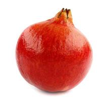 Isolated pomegranate. One whole pomegranate fruit isolated on white background photo