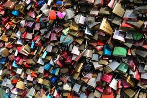 Padlock on Hohenzollern Bridge in Cologne, Germany photo