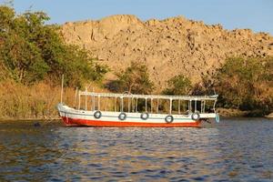 Boat in Nile River, Aswan, Egypt photo