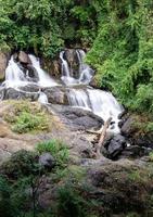 Fresh waterfall from the granite cliff. photo