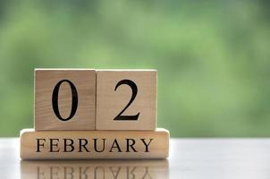 February 2 calendar date text on wooden blocks with customizable space for text or ideas. Copy space photo