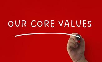 Our core values text written on red cover background. Business concept photo
