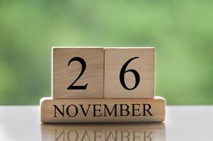 November 26 calendar date text on wooden blocks with copy space for ideas or text. Copy space photo