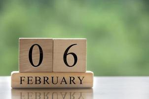 February 6 calendar date text on wooden blocks with customizable space for text or ideas. Copy space photo