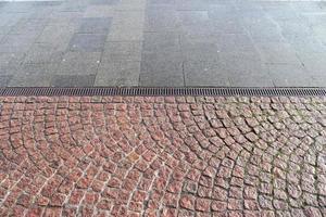 Detailed close up on old historical cobblestone roads and walkways photo