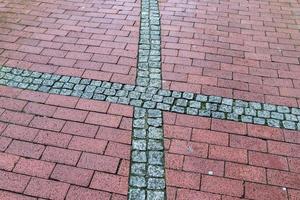 Detailed close up on old historical cobblestone roads and walkways photo