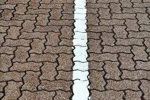 Detailed close up on old historical cobblestone roads and walkways photo