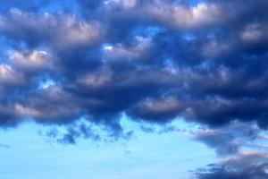 Beautiful panorama of orange and yellow clouds at sunrise photo