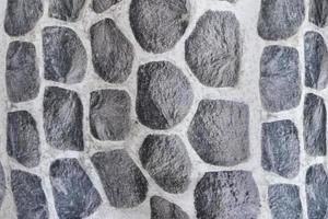 Detailed close up view on samples of cloth and fabrics in different colors found at a fabrics market photo
