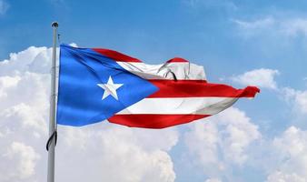 bandera de puerto rico - bandera de tela ondeante realista. foto