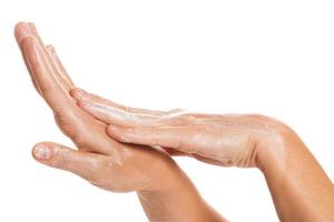 Female hands and moisturizing cream photo