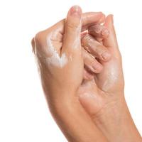 Female hands and moisturizing cream photo