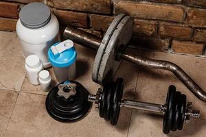 Food supplements and sport equipment photo