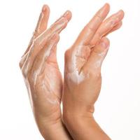 Female hands and moisturizing cream photo