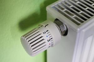 Close-up view of a heater thermostat. photo