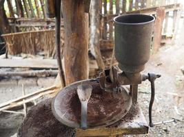 Side view of old coffee grinder photo