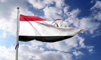 Ilustración 3d de una bandera de yemen - bandera de tela ondeante realista. foto