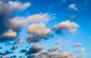 Beautiful panorama of orange and yellow clouds at sunrise photo