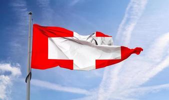 Swiss flag - realistic waving fabric flag. photo