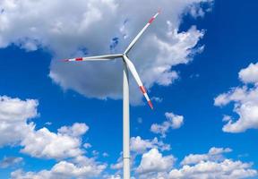 Panoramic view on alternative energy wind mills in a windpark in northern europe photo